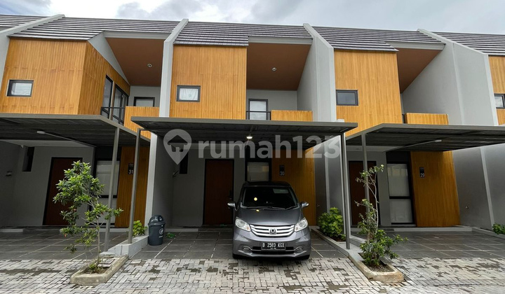 Translated text:
Two-Story Fully Furnished House Strategically Located Near Living World Grand Wisata Mall Translated text:
Two-Story Fully Furnished House Strategically Located Near Living World Grand Wisata Mall