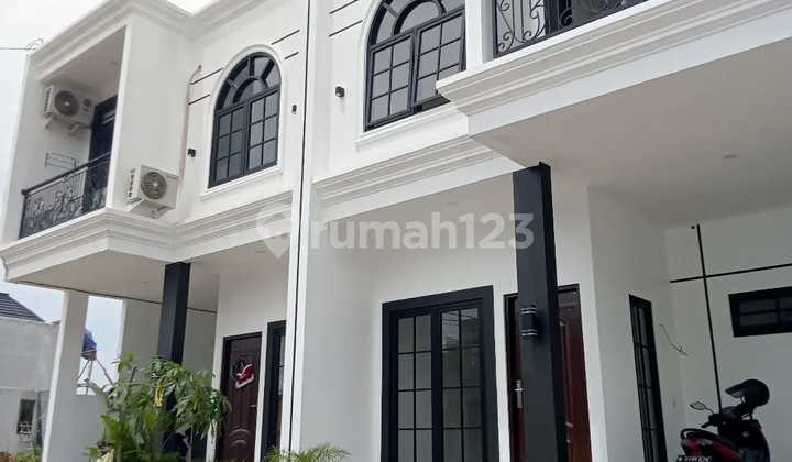 Rumah Mewah Klasik 2 Lantai di Kelapa Dua Depok Rumah Mewah Klasik 2 Lantai di Kelapa Dua Depok