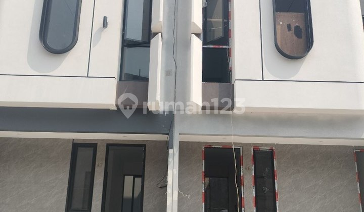 Rumah 2 Lantai Design Modern Tropis Dlm Cluster One Gate System di Setu Cipayung Jakarta Timur Rumah 2 Lantai Design Modern Tropis Dlm Cluster One Gate System di Setu Cipayung Jakarta Timur
