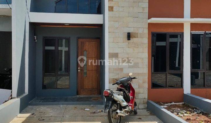 tampak depan rumah minimalis di banjaran pucung