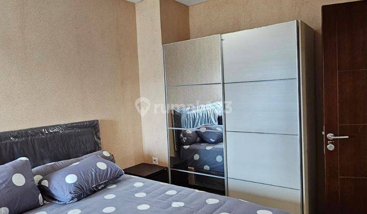 kamar tidur apartemen fully furnished di springhill