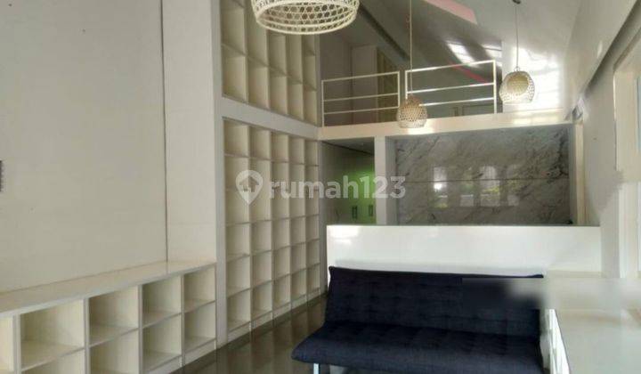 ruang keluarga rumah mewah bali village kemang