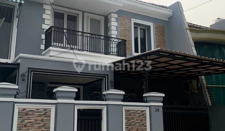 rumah cempaka putih luas 180m hadap selatan kondisi semi furnish