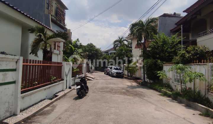 rumah hoek kelapa sawit luas 400m hadap timur utara jalan 2 mobil 2