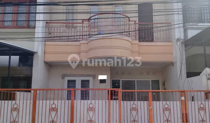 rumah taman nyiur sudah tinggi dari jalan luas 90m bangunan 2 lantai