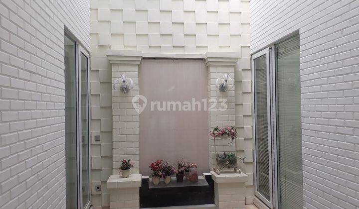 Rumah 2 Lantai Bagus SHM Bulovard Raya Bonus Swiming Pool 2