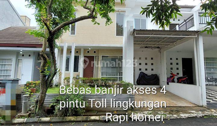 Rumah 2 lantai homey sudah renovad dekat spot Club The Addres 1