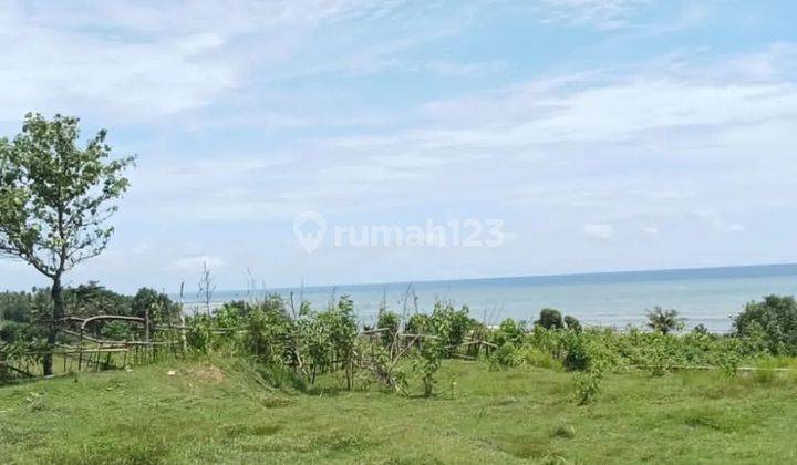 Land in front of the beach with sea and sunset views at the center of Medewi surfing 1