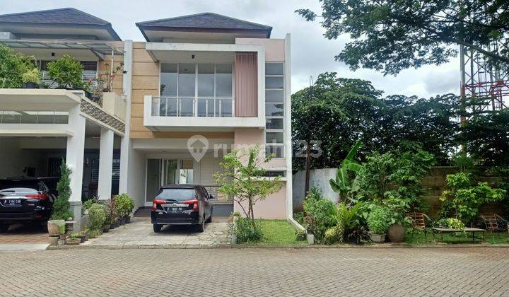 Rumah minimalis samping taman Modern Land 2