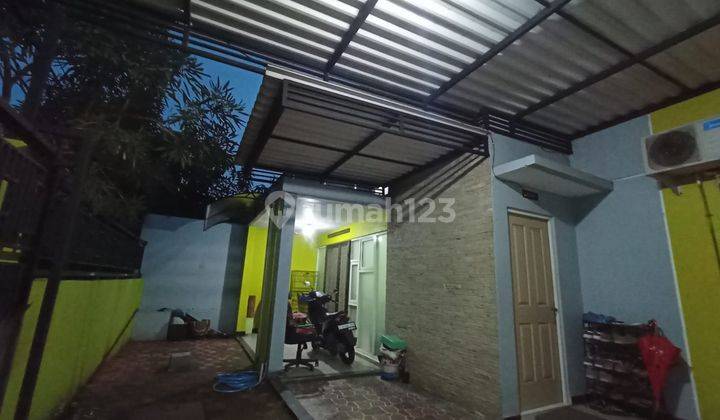 Rumah Minimalis di Puri surya jaya 2