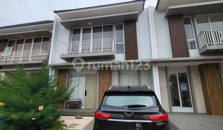 Furnished house with a beautiful natural location in Nara Village Gading Serpong.