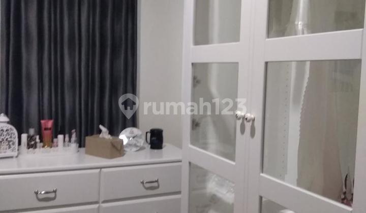 Low Floor Apartment Beautifully Furnished Strategic Location Puri Orchid West Jakarta Selling at a Loss 2