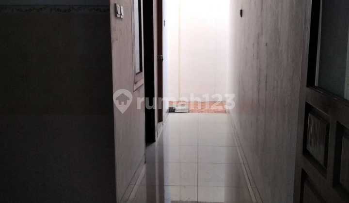 di Jl Kelapa Sawit 15, Tangerang 11