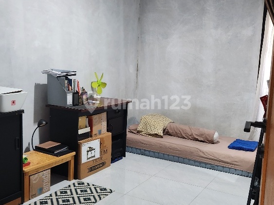 Single-story house fully renovated in front of the garden at Nusa Loka, BSD City. 2