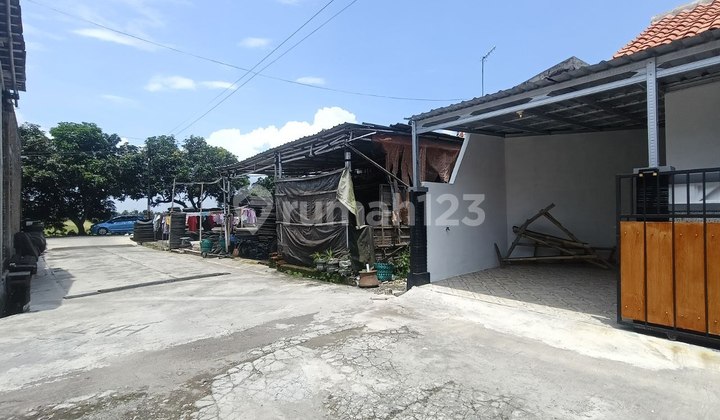 Rumah Baru 1,5 Lantai Bonus Pagar Kanopi Siap Pakai di Jati Gatak 2