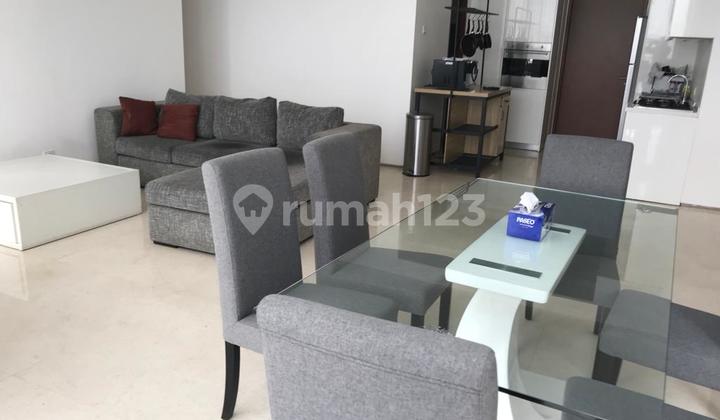 Apartemen Sudirman Suites 2BR Furnished Bagus
