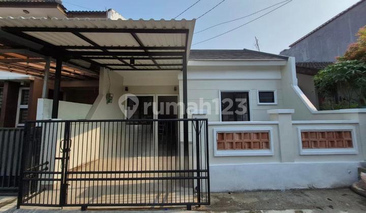 A NEAT AND WELL-MAINTAINED HOUSE WITH A GOOD LOCATION IN GRIYA LOKA BSD. 2