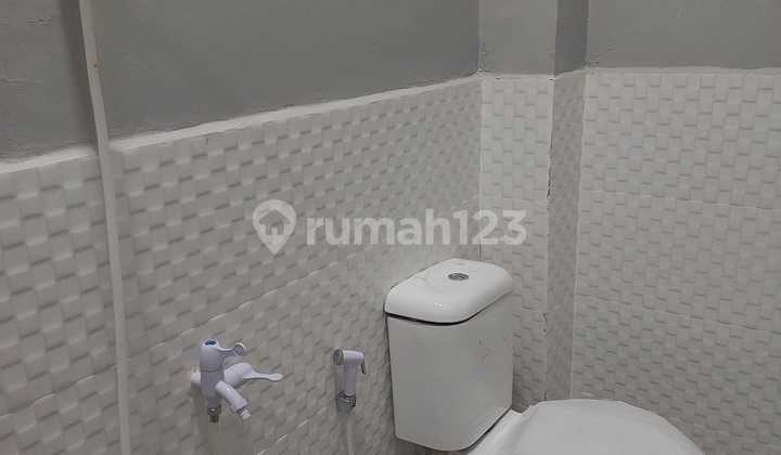 Rumah Biru Harga Terjangkau di Villa Gading Harapan 73256 MIA 2