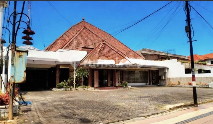 For Sale Large House by the Main Road with Spacious Yard, Ideal for Business Strategically Located in Surabaya, East Java