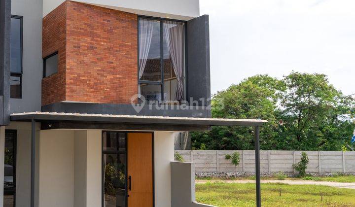 Rumah Hook Modern Tropis di Bintaro 1