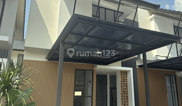 Rumah 2lt Dpn Taman 6x17 102m 2kt Cluster Mahakam Jgc Jakarta Garden City 1