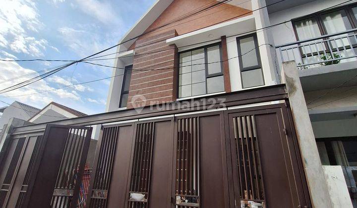 Jual Cepat rumah Sunrise Garden.baru..minimalis..lux Uk 7x15 2.5lt . Jln 2 Mbl..  1