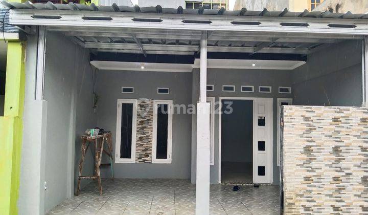 Harga Terjangkau Rumah Abu2 Minimalis di Pondok Ungu Sektor V 1