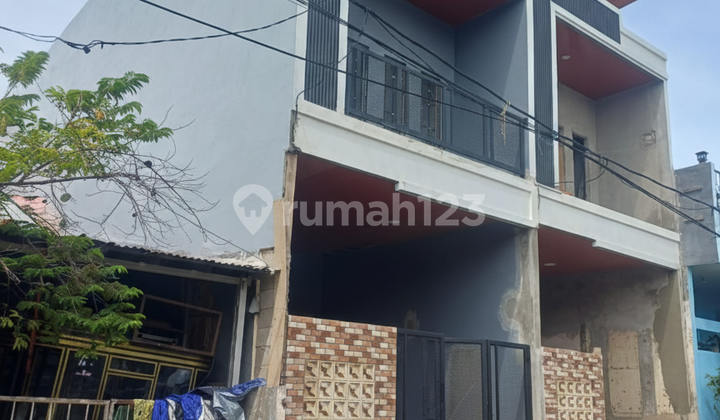 Ready-to-Occupy House in Well-Maintained Condition at Harapan Indah (13729 Rn)