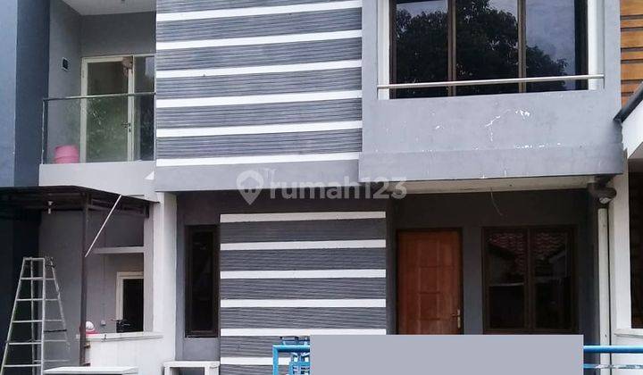 DIJUAL RUMAH SIAP HUNI TAMAN PUSPA RAYA NC 09 1