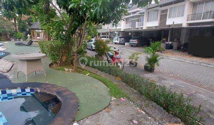 Rumah Depan Kolam Renang di cluster Edinburg Puri Mansion 2