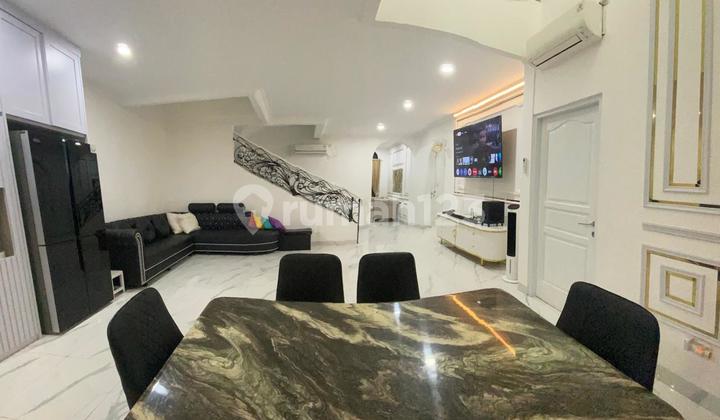 Rumah Mewah Siap Huni Depan Taman di Delatinos Bsd 2