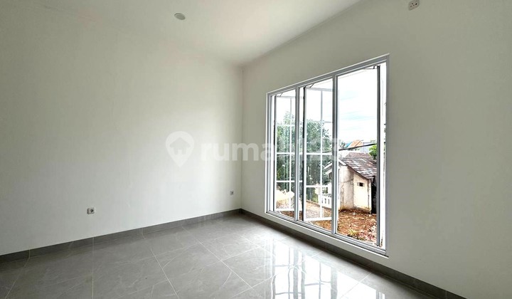 Beautiful 2-Story House with Front and Back Garden Spacious Layout 2