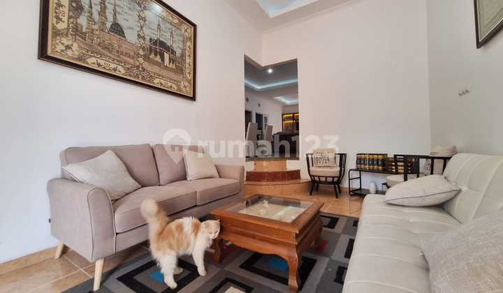 Rumah Modern Nyaman dengan Taman Asri – Lokasi Strategis 2