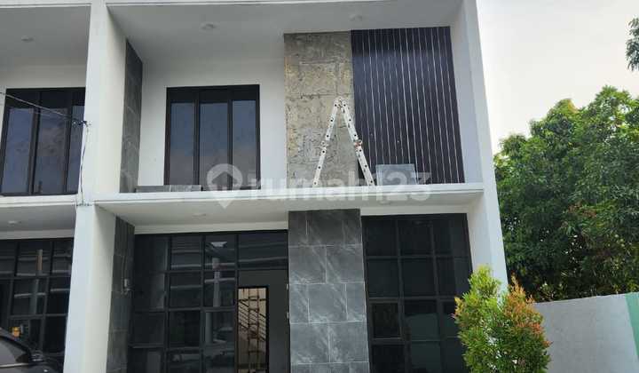 Modern Minimalist New House in the New Cipadu Larangan Cluster Modern Minimalist New House in the New Cipadu Larangan Cluster