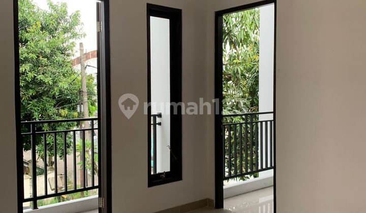 Rumah Dua Lantai Area Puri Madani Siap Huni