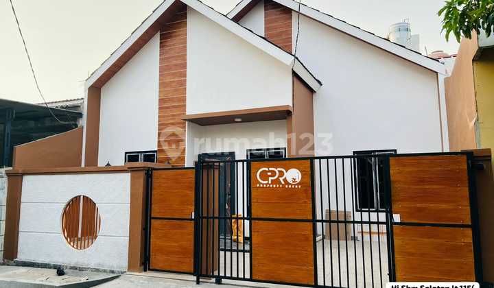 Rumah dengan Desugn Eksklusif Siap Huni di Kawasan Favorit Harapan Indah 13768 Er