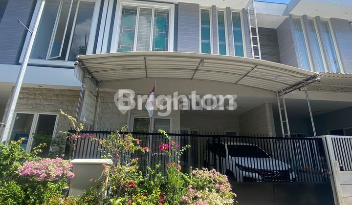 Dharmahusada dekat atlas