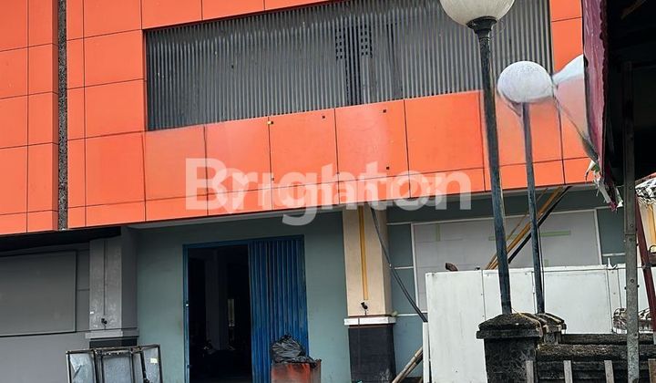 Strategic 9-Unit Shophouse Row in Denpasar 1