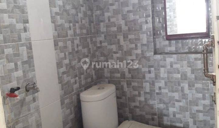 Rumah di Perum Villa Peganden Manyar Gresik Dijual Murah B.u 2 Lt 10
