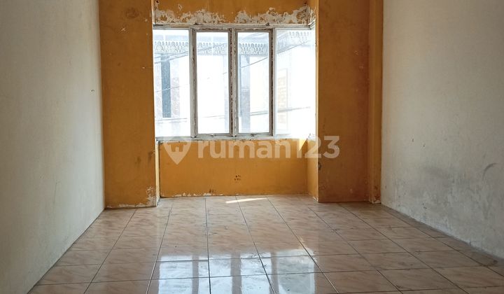 Two-story attached shophouse near Greenlake.