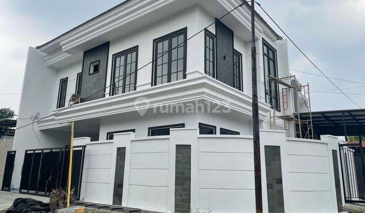 New American Style Jemursari dekat dengan Raya Jemursari Row lebar One Gate system