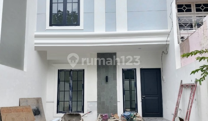 New American Minimalis Manyar New American Minimalis Manyar