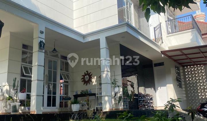 Rumah Modern Hook 232 M² di Tamansari Bukit Bandung #