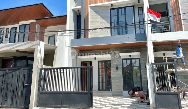 Sisa 1 Unit Baru Gress Rumah Modern Scandinavian 2 Lantai Sutorejo Surabaya Mewah Dpn Fasum row 3 mobil 1