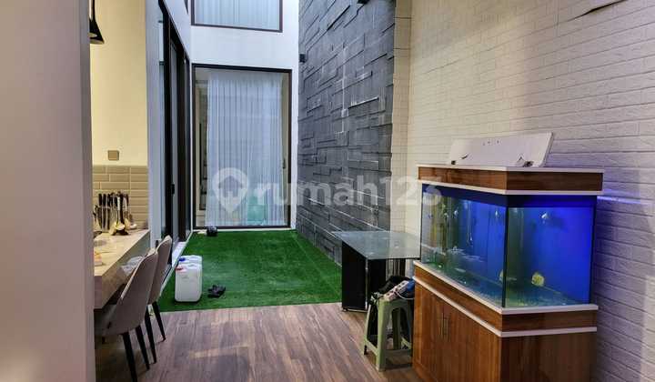 Rumah Mewah Modern One Gate System di Taman Kopo Indah 3 2