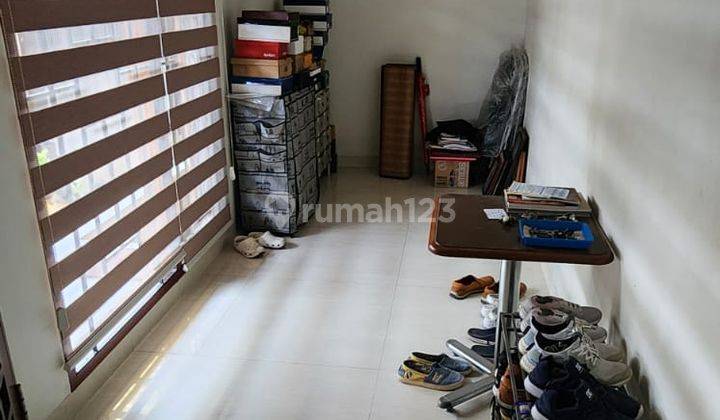 Rumah Tidak Banyak Sekat Dan Atap Tinggi di Taman Kopo Indah 2 2