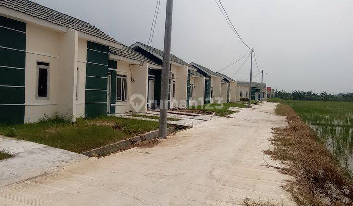Dijual rumah over kredit  gandeng di Pesona garden mukti wari cibitung cbl 7
