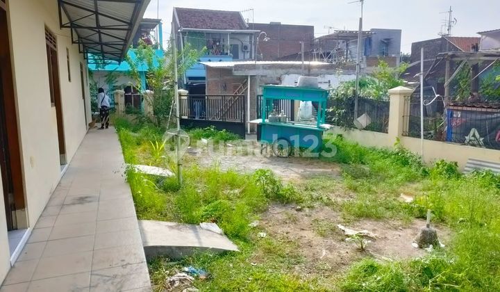 Beli tanah bagus Bonus bangunan koskosan, masih ada lsisa tanah 8