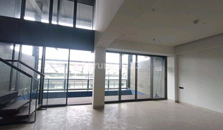 ruang keluarga carstensz apartemen mewah 
