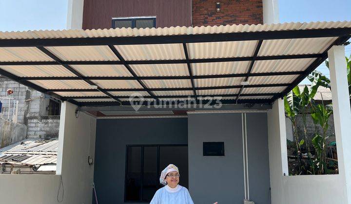 Rumah 3 lantai dalam cluster harga terjangkau.  2